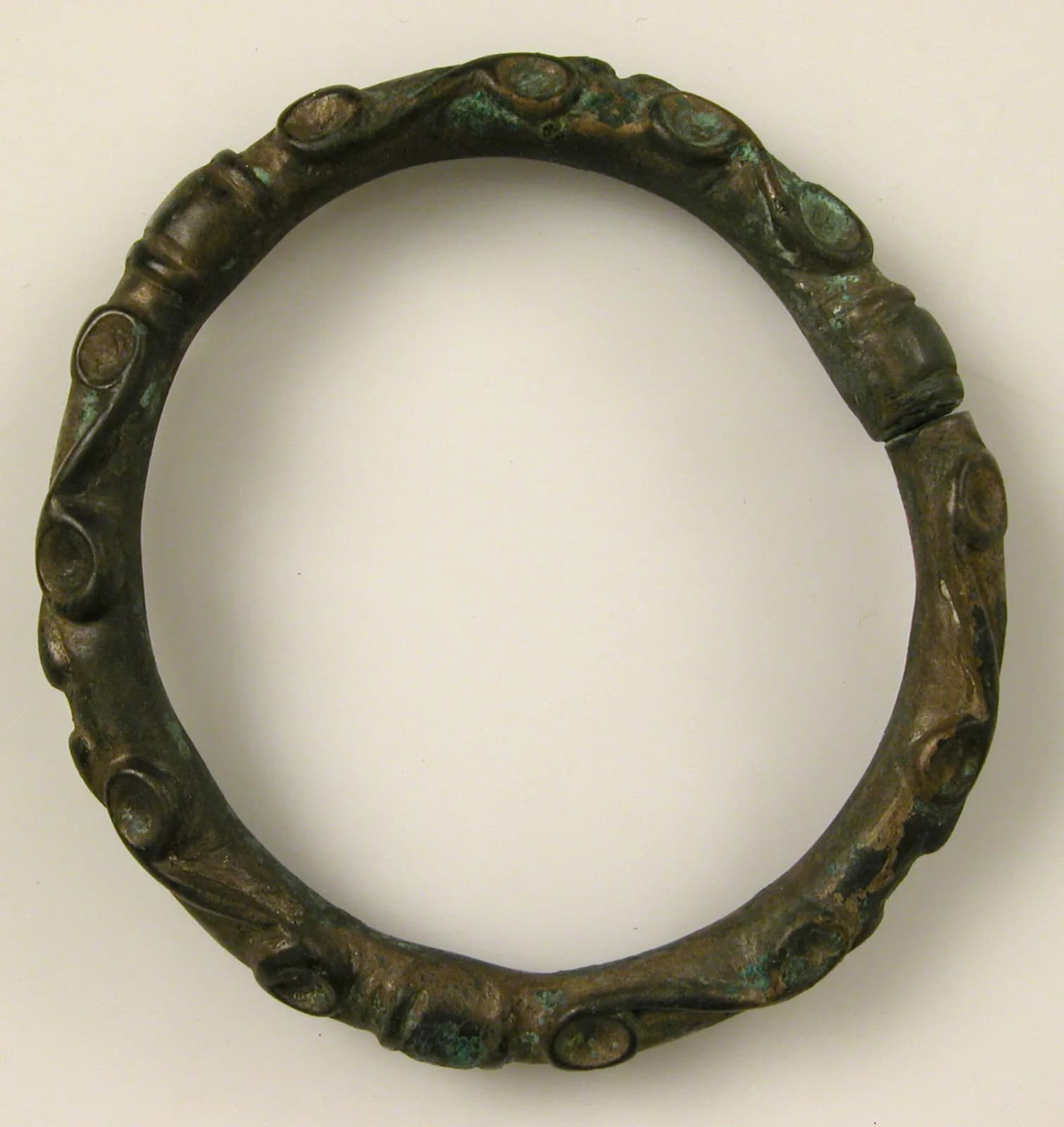 Cultural archive image of “Bracelet with Spiral Designs”, catalogued as Celtic, dating to 2nd century BCE. Medium: Copper alloy. Dimensions: Overall: 2 13/16 x 2 11/16 x 3/8 in.