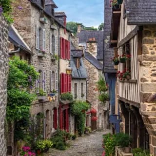Cultural archive image of “Dinan is a medieval hilltop town in Brittany overlooking the River Rance, surrounded by…”, associated with Brittany.