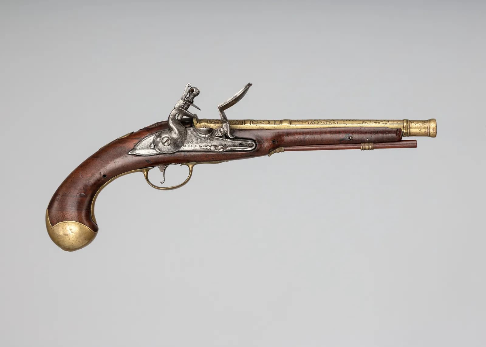 Cultural archive image of “Flintlock Pistol”, catalogued as British and Scottish, dating to ca. 1700–1730, associated with Scotland. Medium: Steel, wood (walnut), brass, bronze, iron (?).