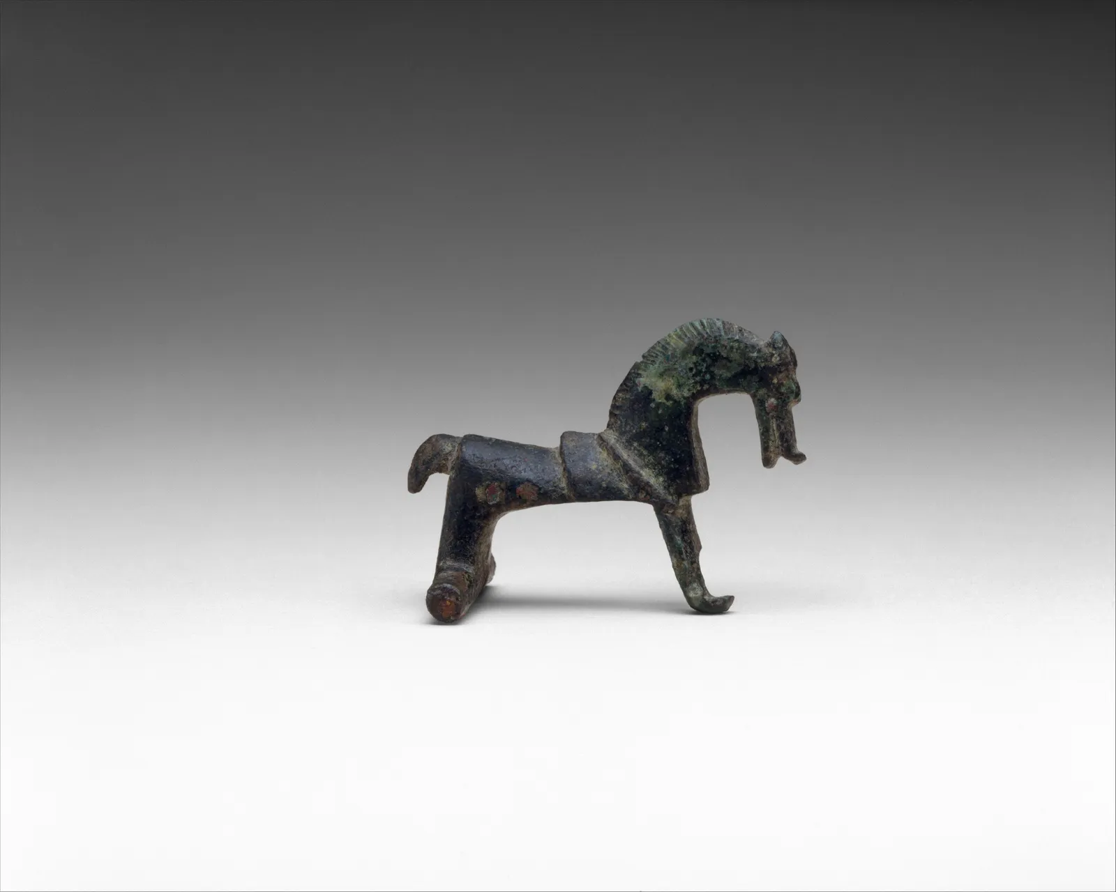 Cultural archive image of “Horse-Shaped Brooch”, catalogued as Celtic, dating to 650–550 BCE, associated with central Europe. Medium: Bronze. Dimensions: Overall: 1 5/16 x 1 13/16 x 1 1/4 in.