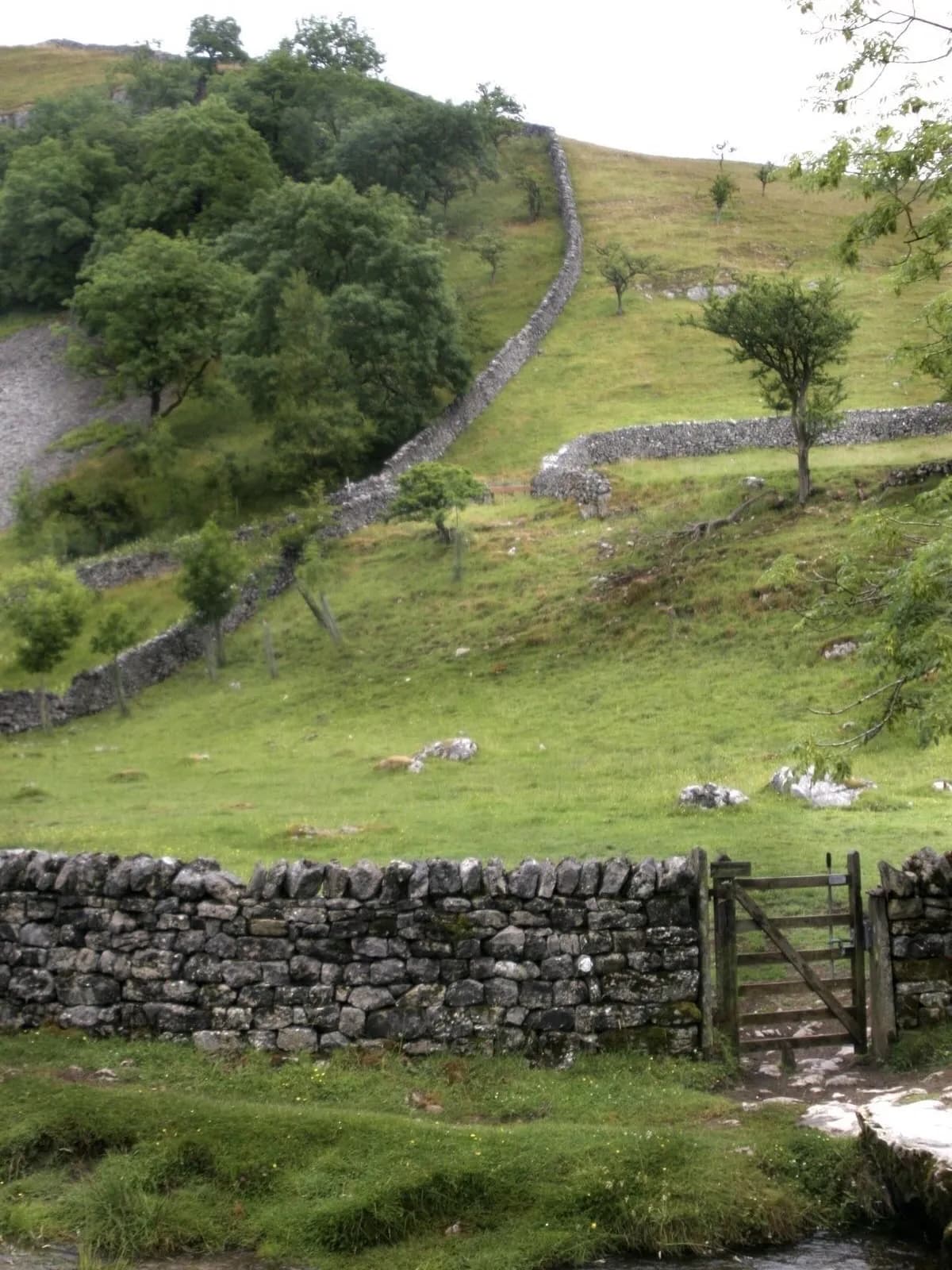 Cultural archive image of “Ireland has roughly 400,000km of dry stone walls through its countryside, mostly in the…”, associated with Ireland.