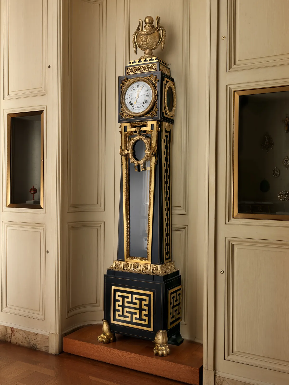 Cultural archive image of “Longcase astronomical regulator”, catalogued as Horology, dating to ca. 1768–70. Medium: Case: oak veneered with ebony and brass, with gilt-bronze mounts; Dial: white enamel; Movement: gilded brass and steel.