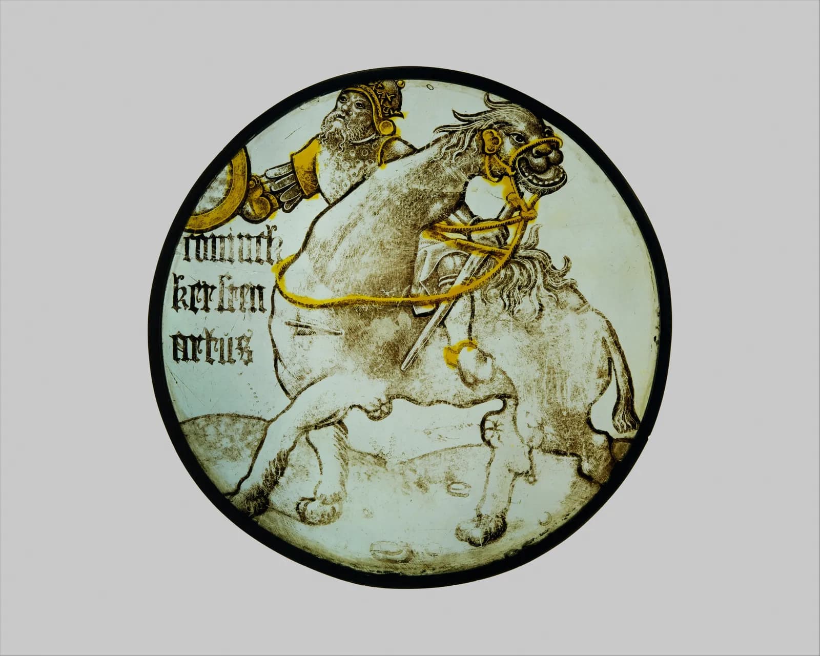 Cultural archive image of “Roundel with King Arthur Riding on a Camel (from a Series of the Nine Heroes)”, catalogued as North Netherlandish, dating to 1500–1510, associated with Leiden (?), North Netherlands. Medium: Colorless glass,…