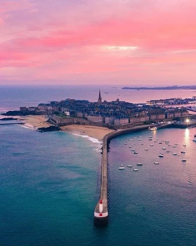 Cultural archive image of “Saint-Malo is a granite walled port city on the north coast of Brittany, named after a…”, associated with Saint-Malo.