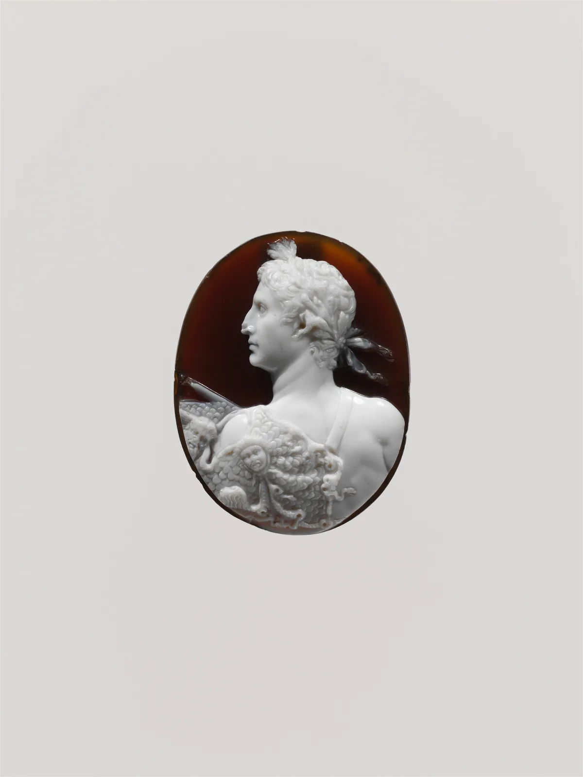 Cultural archive image of “Sardonyx cameo portrait of the Emperor Augustus”, catalogued as Roman, dating to ca. 41–54 CE. Medium: Sardonyx. Dimensions: 1 7/16 × 1 1/8 × 5/16 in.