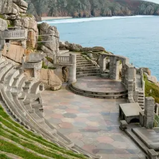 Cultural archive image of “The Minack Theatre is an open-air amphitheatre carved into the granite cliffs above the…”.