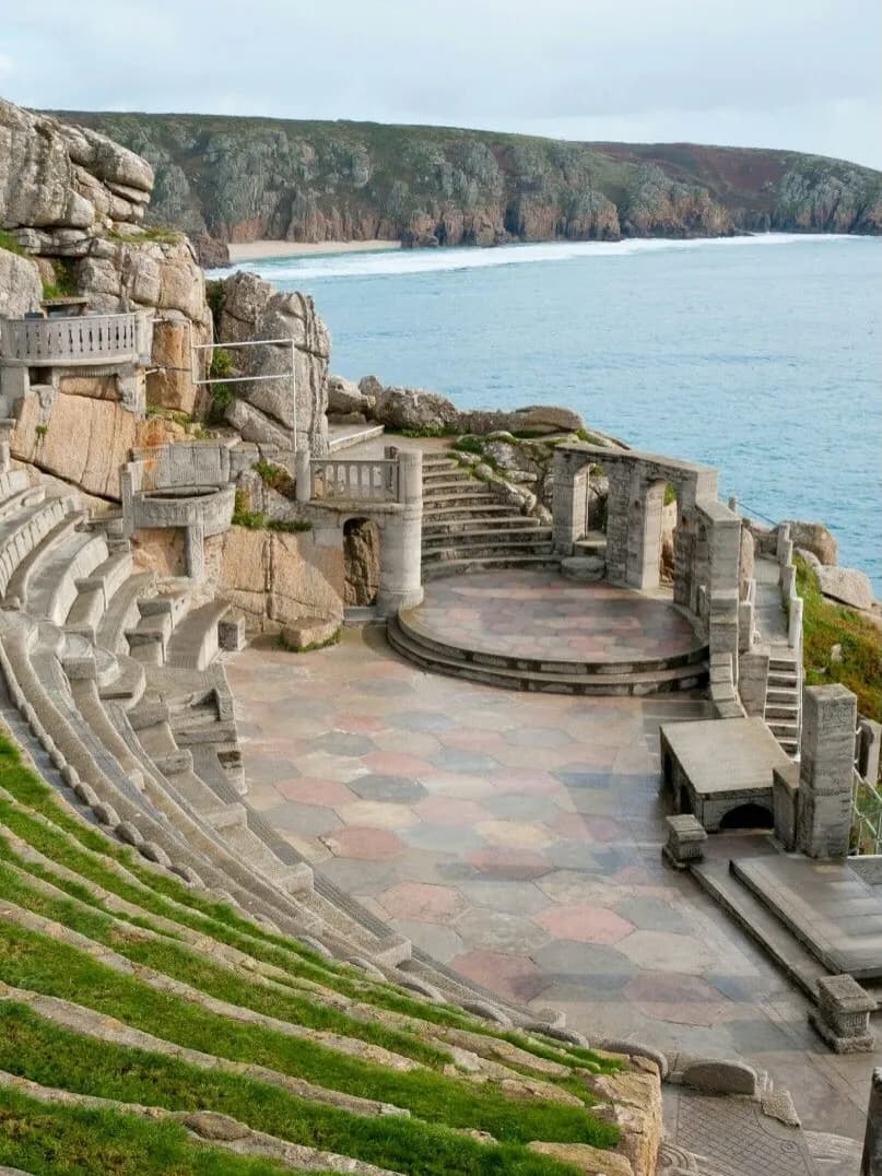 Cultural archive image of “The Minack Theatre is an open-air amphitheatre carved into the granite cliffs above the…”.